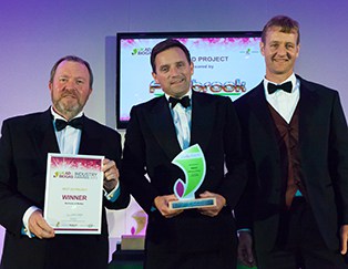 Barfoots of Botley receive their trophy for Best AD Project from (right) Shaun Cherry of Fernbrook Bio